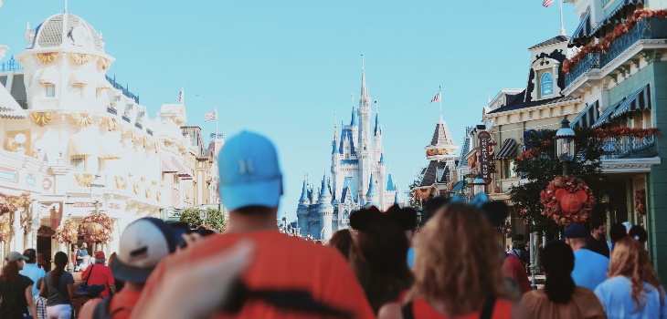 A crows of people on the streets of Walt Disney World